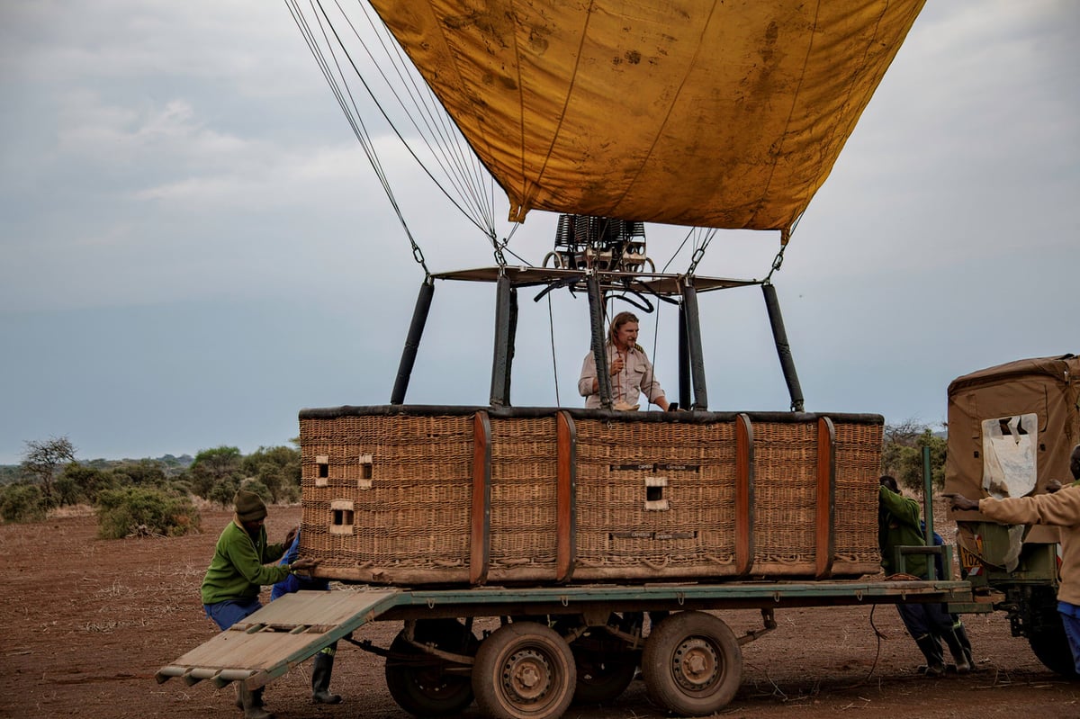 Hot air balloon being steered in the early morning at Amboseli National Park